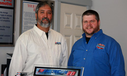 Ranji and Mark in the shop